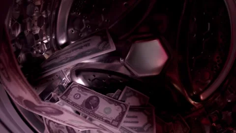 Money laundering involves concealing the illicit origins of funds, ensuring  Stock Footage 261591822