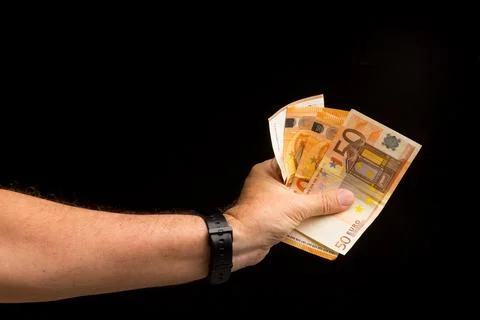 Money notes in a person's hand Stock Photos
