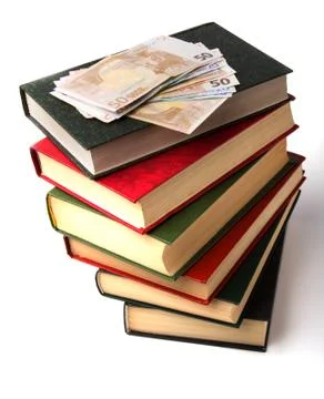 Money over book stack.  education  concept Stock Photos