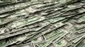 Money Piles Stacks of Dollars Financial US Currency Tax Seamless Loop Brighter HD Footage