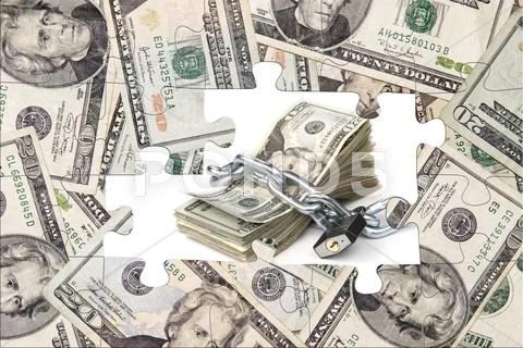 Money puzzle with chained cash Stock-Fotos