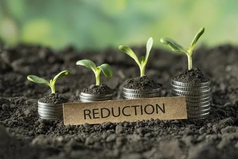 Money reduction Stock Photos