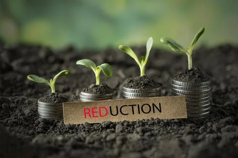 Money reduction Stock Photos