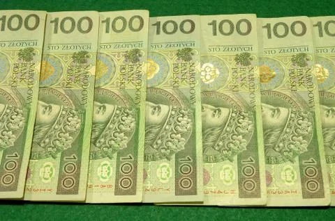 Money - row of banknotes - polish currency 100 zloty banknotes Stock Photos
