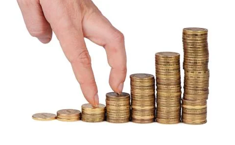 Money stack in hand  isolated on white background Stock Photos