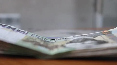 Money on the table 2 Stock Footage 322170769