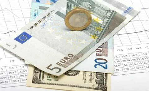 Money for the table with figures. Stock Photos