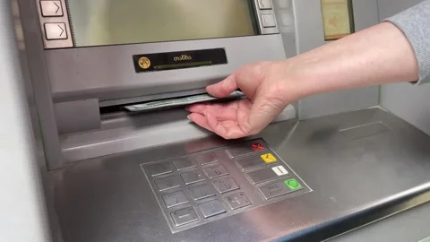 Money withdrawal from an ATM, Payment processing at the cash machine Stock Footage 243424639