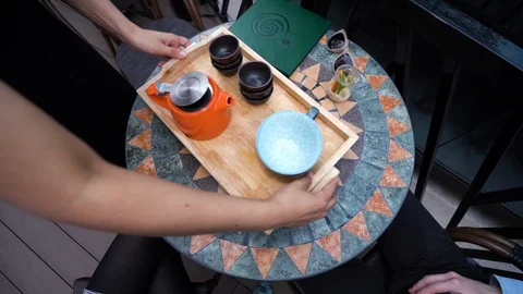 Mongolia 009 Pouring tea for two Stock Footage 128396149