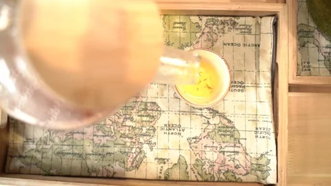 Mongolia 031 Pouring orange tea leaves in water Stock Footage 128400338