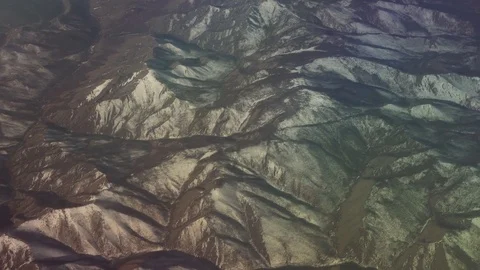 Mongolia aerial view of mountains covered with snow in the spring stock footage Stock Footage 76177738
