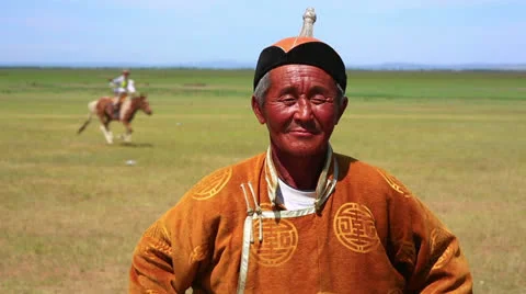 MONGOLIA - JULY 2013: Mongolian man with traditional clothes 스톡 동영상 32425345