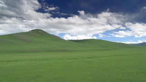 Mongolia mountain hillside marked by white stone Soyombo symbol - Mongol Emblem Stock Footage 339470200