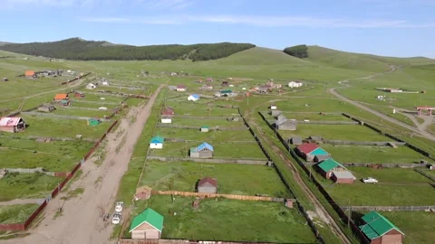Mongolia town aerial drone view with colorful roofs - Street Grid and Land Use Stock Footage 339720456
