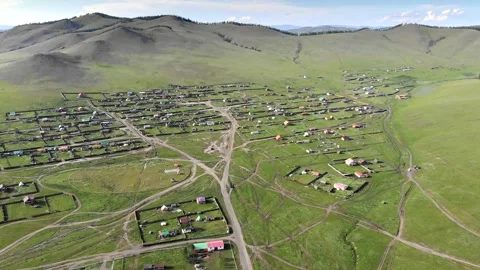 Mongolia town aerial drone view with colorful roofs - Street Grid and Small City Stock Footage 339720553
