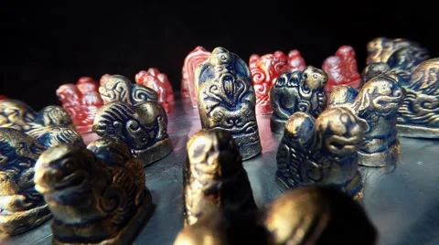 Mongolian Group of Colored Iron Figures Spinning Close-Up Stock Footage 62635563