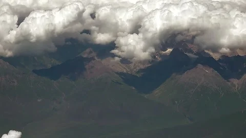 Mongolian mountains seen from plane in a high aerial view - Natural Environment Stock Footage 339727269