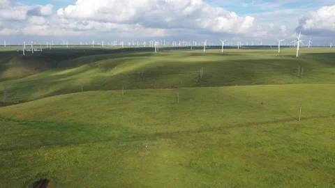 Mongolian Yurt Camp On Grassland With Wind Farm Inner Mongolia 02 Stock Footage 337809282