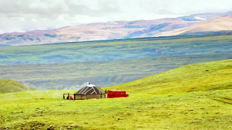 Mongolian yurt on a green steppe landscape Stock Footage 337023928