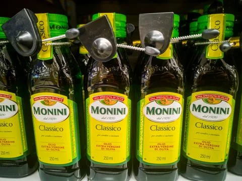 Monini Classico Extra Virgin Olive Oil Extra Virgin on sale on a hypermarket Stock Photos