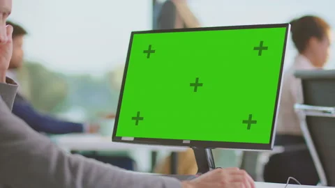 Monitor and hands writing on keyboard Stock Footage 164678379