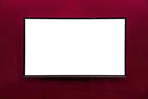 A monitor with copy space for text hanging on the wall with red wallpaper. .. 스톡 사진
