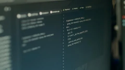 Monitor display of software developer typing database functions script Foto stock