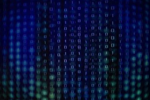 Monitor displaying flowing binary code matrix on blue strip lines background. Stock Photos