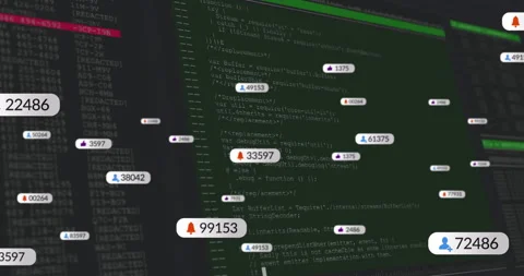 Monitor displaying green syntax highlights while floating notification icons Stock Footage 309092969