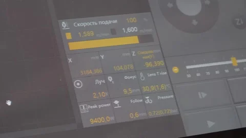 A monitor that displays information about the processing of a part in mechan Stock Footage 285037509