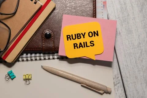 Monitor in modern office with text RUBY ON RAILS on the screen Stock Photos