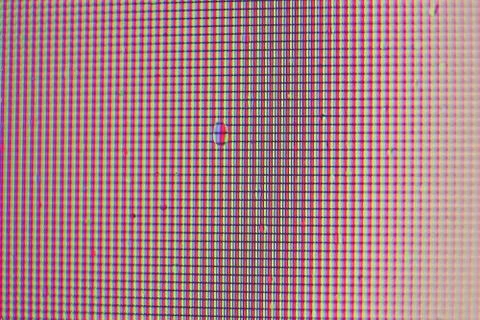 Monitor pixel macro background. Water drops on pixilated surface. Display pix Stock Photos