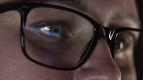 The monitor is reflected in the glasses Stock Footage 274973082