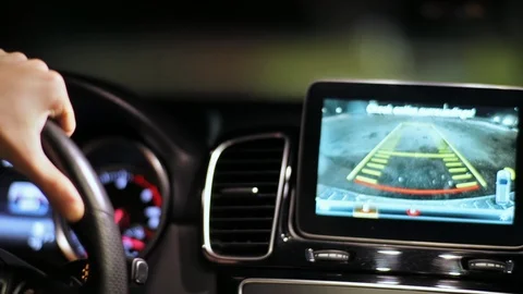 Monitor reverse video camera. Car rear view system. Footage from automobile Stock Footage 103712936