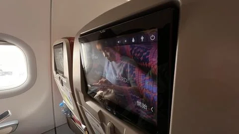 The monitor screen on board the Batik Air flight Jakarta Pekanbaru Stock Photos