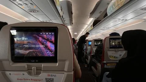 The monitor screen on board the Batik Air flight Jakarta Pekanbaru Stock Photos