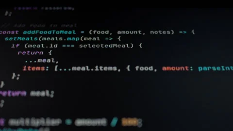 Monitor screen displays fluid sequence of numbers and symbols illustrating d Stock Footage 331474994