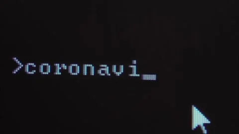 Monitor screen is a macro, coronavirus label is entered on black background. Video stock 142799744