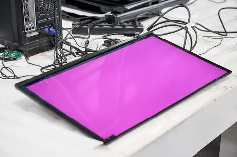 Monitor screen testing process at electronics manufacturing plant with visible Stock Photos