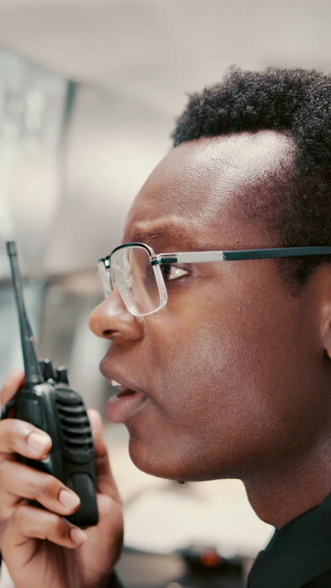 Monitor, security or black man with radio in control room, cctv observation or Stock Footage 335298886