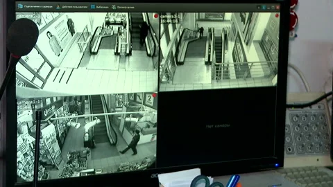 Monitor the security panel of the shopping center view of the escalators Stock Footage 89463002