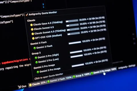 A monitor window displays artificial intelligence quota status and model Stock Photos
