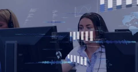 Monitoring agent wearing headset and light ruffled blouse at ops center, viewing Stock Photos