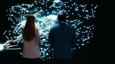Monitoring AI model, AR projection and engineering team collaborating 写真素材