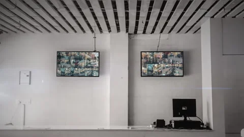 Monitoring CCTV Shopping Mall Security System TV Control Room Zoom In Stock Footage 277573904