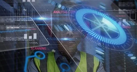 Monitoring engineer viewing holographic interface at industrial site, wearing Stockfoto's