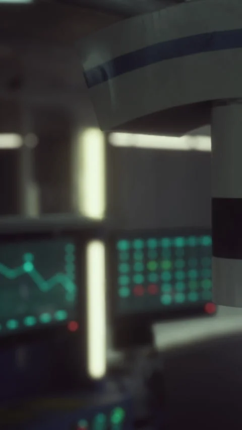 Monitoring equipment displays data in a control room during daytime hours Stock Footage 337974510