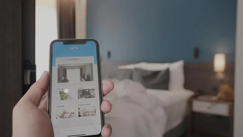 Monitoring Home Security with Smart Technology Stock Footage 314570468