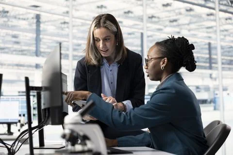 Monitoring microchip production, AI model and SOC architects Stock Photos