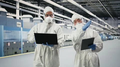 Monitoring microchip production, devices and engineering team brainstorming Stock Footage 333394048